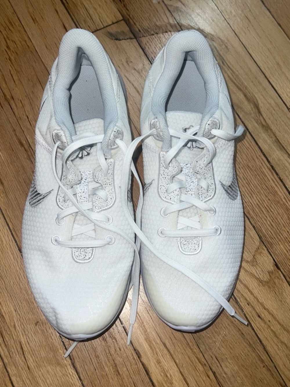 Nike White Athletic Mesh Sneakers with Silver Logo